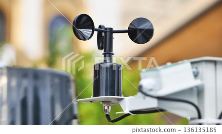 Anemometer measuring wind speed at weather station Anemometer measuring wind speed at weather station 136135185
