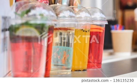 Refreshing summer drinks serving at outdoor bar Refreshing summer drinks serving at outdoor bar 136135230