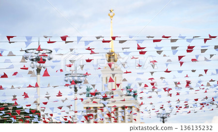 Bunting flags decorating VDNKh park in summer 136135232
