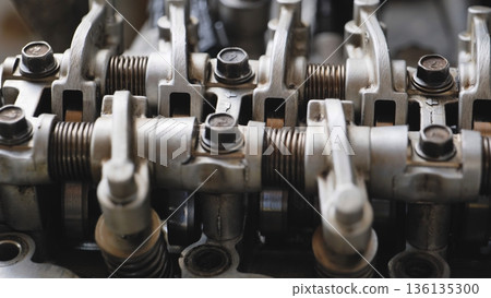 Car engine parts closeup for repair and maintenance Car engine parts closeup for repair and maintenance 136135300