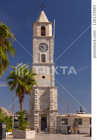 Stone clock tower in Symi island Greece Stone clock tower in Symi island Greece 136135665