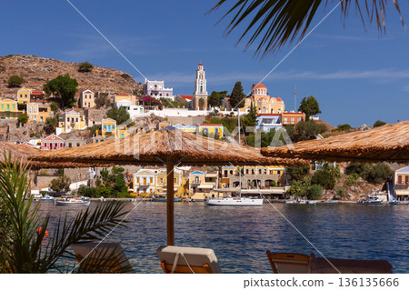 Colorful houses on hillside in Symi island Greece Colorful houses on hillside in Symi island Greece 136135666