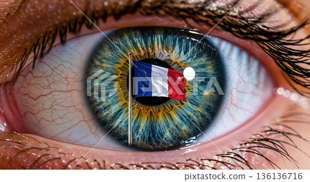 A detailed close-up of a human eye with a vibrant French flag displayed within its pupil, symbolizing national identity and a deep focus on France. A detailed close-up of a human eye with a vibrant French flag displayed within its pupil, symbolizing national identity and a deep focus on France. 136136716