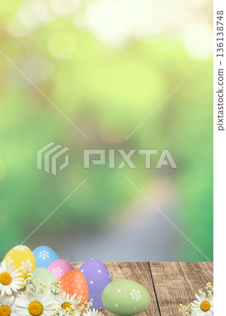 Decorated easter eggs with flowers on wooden table 136138748