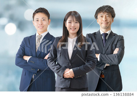 Three-person business team 136138884