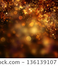 Golden Bokeh Light Background with Warm Glowing Sparkles and Soft Abstract Holiday Luxury Texture 136139107