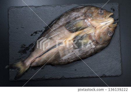 Atka mackerel filleted before cooking 136139222
