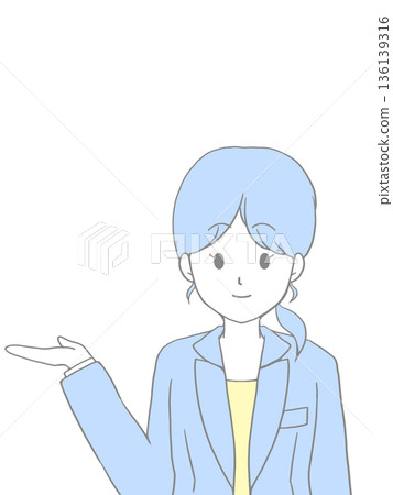 A woman with a ponytail in a suit giving directions with a smile 136139316