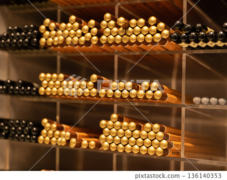 Golden and black pencils arranging on shelves in a stationery retail shop Golden and black pencils arranging on shelves in a stationery retail shop 136140353