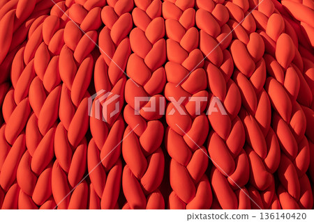 Braided chunky knit pattern creating a warm cozy vibrant textile surface Braided chunky knit pattern creating a warm cozy vibrant textile surface 136140420