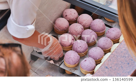 Moscow ice cream vendor serving sweet berry dessert Moscow ice cream vendor serving sweet berry dessert 136140599