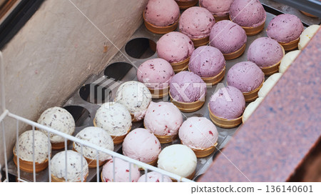 Rows of scoops of ice cream in display freezer in Moscow 136140601