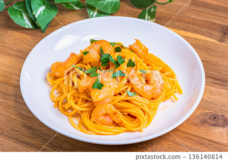 Shrimp tomato cream pasta Western food served on a white plate Shrimp tomato cream pasta Western food served on a white plate 136140814