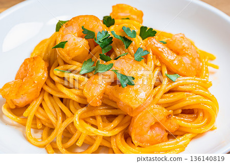 Shrimp tomato cream pasta Western food served on a white plate 136140819