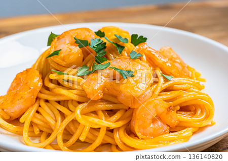 Shrimp tomato cream pasta Western food served on a white plate 136140820