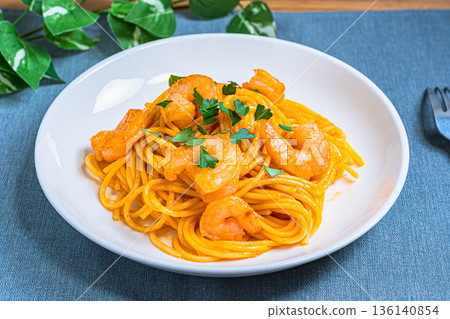 Shrimp tomato cream pasta Western food served on a white plate Shrimp tomato cream pasta Western food served on a white plate 136140854