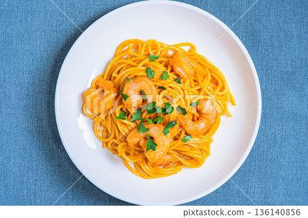 Shrimp tomato cream pasta Western food served on a white plate Shrimp tomato cream pasta Western food served on a white plate 136140856