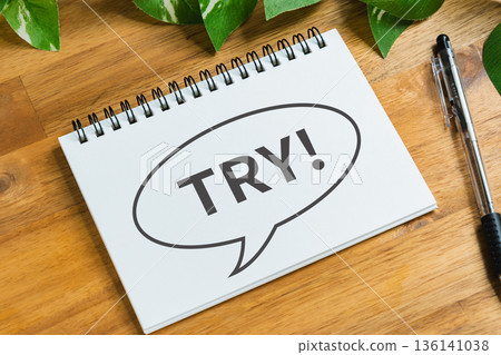 A notepad with the word TRY! written on it A notepad with the word TRY! written on it 136141038