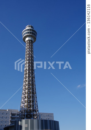 Marine Tower shining in the blue sky Marine Tower shining in the blue sky 136142116