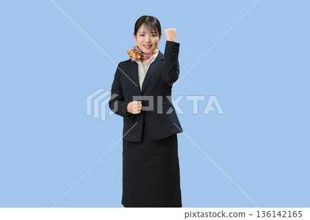 Blue background and a woman wearing a scarf 136142165