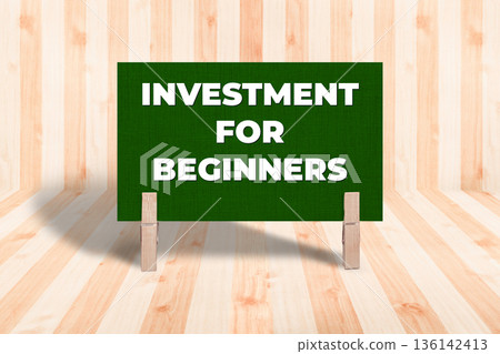Concept words Investment For Beginners, Green Grunge Texture Rectangle Card Held By Clothespin Wooden Texture Background, Business and Investment For Beginners Theme Concept words Investment For Beginners, Green Grunge Texture Rectangle Card Held By Clothespin Wooden Texture Background, Business and Investment For Beginners Theme 136142413
