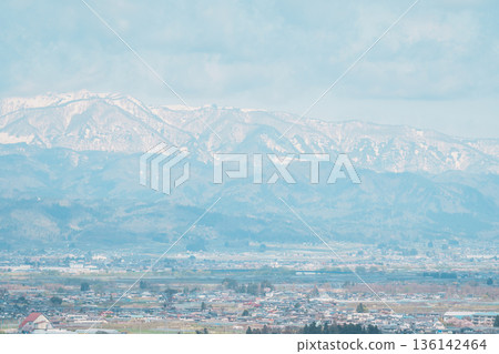 Sakura Cherry Blossom with snow mountain in Spring season, Tendo Park or Maizuru Park, landmark popular for tourist attractions in Yamagata prefecture, Tohoku, Japan 136142464