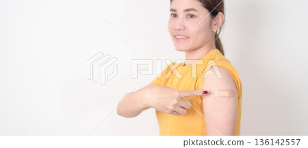 Adult Woman with bandage after received vaccine. Vaccination and Immunization for Influenza, HPV, Zoster, IPD, DTP or Diphtheria, Tetanus and Pertussis, MMR, Hepatitis B, Covid and Nipha virus vaccine Adult Woman with bandage after received vaccine. Vaccination and Immunization for Influenza, HPV, Zoster, IPD, DTP or Diphtheria, Tetanus and Pertussis, MMR, Hepatitis B, Covid and Nipha virus vaccine 136142557