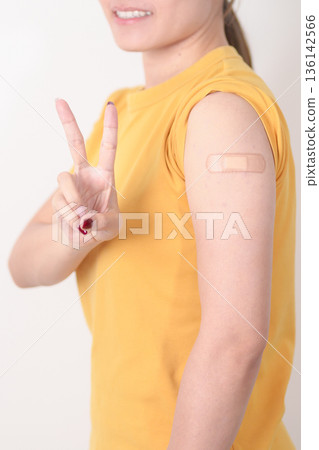 Adult Woman with bandage after received vaccine. Vaccination and Immunization for Influenza, HPV, Zoster, IPD, DTP or Diphtheria, Tetanus and Pertussis, MMR, Hepatitis B, Covid and Nipha virus vaccine Adult Woman with bandage after received vaccine. Vaccination and Immunization for Influenza, HPV, Zoster, IPD, DTP or Diphtheria, Tetanus and Pertussis, MMR, Hepatitis B, Covid and Nipha virus vaccine 136142566