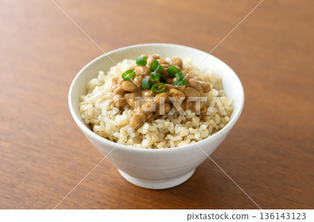 Brown rice topped with natto and green onions Brown rice topped with natto and green onions 136143123