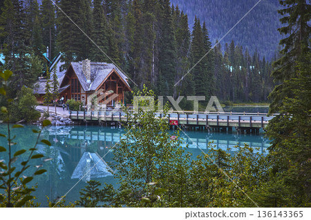 Emerald Lake Lodge Reflected in Turquoise Water with Bridge and Forest at Sunrise Emerald Lake Lodge Reflected in Turquoise Water with Bridge and Forest at Sunrise 136143365