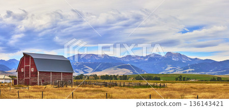 Panorama Red Barn With Wyoming Mountain Landscape And Dramatic Sky Panorama Red Barn With Wyoming Mountain Landscape And Dramatic Sky 136143421