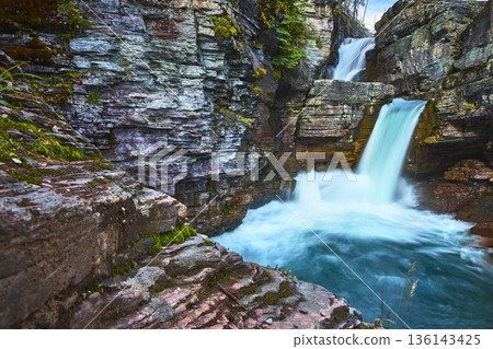 Saint Mary Falls Waterfall and Rocky Pool in Glacier National Park Montana 136143425