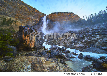 Takakkaw Falls Waterfall and Rocky River in Yoho Surrounded by Mountain Landscape Takakkaw Falls Waterfall and Rocky River in Yoho Surrounded by Mountain Landscape 136143680