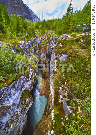 Marble Canyon Turquoise River Flowing Through Rocky Gorge and Pine Forest Mountain Marble Canyon Turquoise River Flowing Through Rocky Gorge and Pine Forest Mountain 136143953