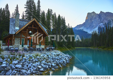 Lodge by Emerald Lake with Sunrise Reflections Forest Trees and Mountain in Canada Lodge by Emerald Lake with Sunrise Reflections Forest Trees and Mountain in Canada 136143958