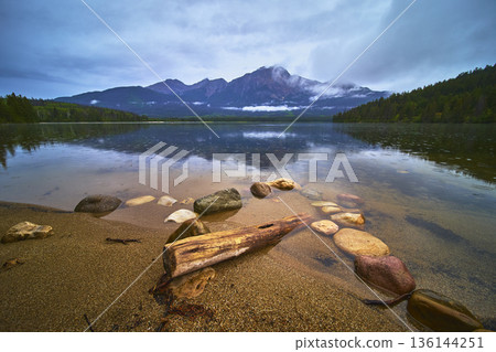 Pyramid Lake Tranquil Water and Mountain Reflections with Rocky Shoreline 136144251