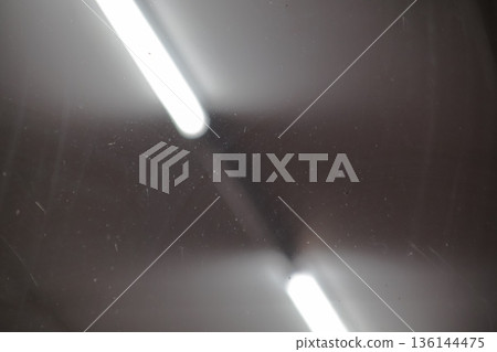 Abstract Texture with Light Streaks and Subtle Dust Particles, Creating a Dynamic and Modern Visual Effect for Graphic Design and Backgrounds Abstract Texture with Light Streaks and Subtle Dust Particles, Creating a Dynamic and Modern Visual Effect for Graphic Design and Backgrounds 136144475