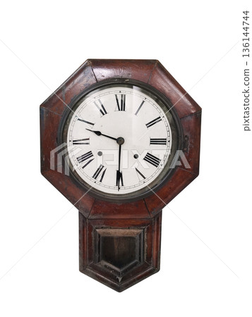 An antique wall clock, displayed separately on a white background. An antique wall clock, displayed separately on a white background. 136144744