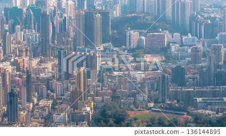 Jan 25 2026 Middle Kowloon Skyline Fades Into Hazy Harbor Mountains 136144895