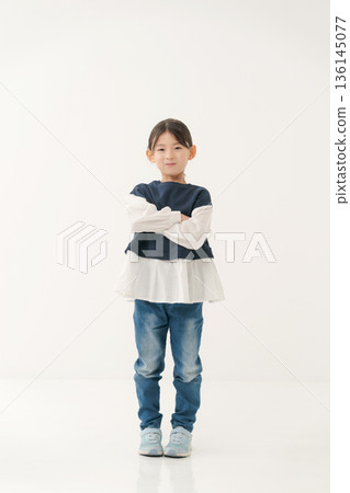 Portrait of a primary school girl, full body Portrait of a primary school girl, full body 136145077