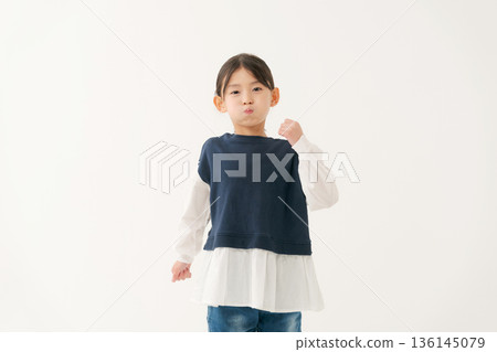 Portrait of an angry elementary school girl Portrait of an angry elementary school girl 136145079