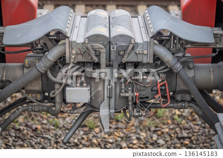 Close-up of Automatic Train Coupler Mechanism Connecting Railway Cars, a Vital Component Close-up of Automatic Train Coupler Mechanism Connecting Railway Cars, a Vital Component 136145183