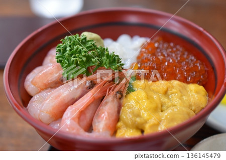 Seafood bowl: sweet shrimp, sea urchin, salmon roe, squid Seafood bowl: sweet shrimp, sea urchin, salmon roe, squid 136145479
