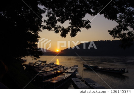 Sunset of the Mekong River Sunset of the Mekong River 136145574