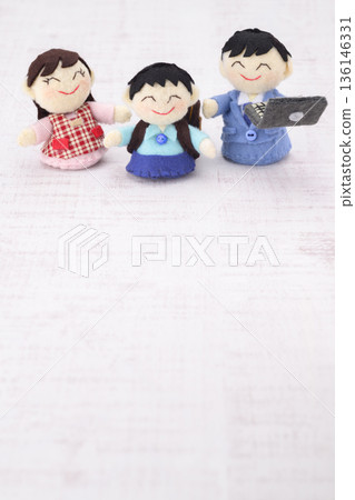 Family of three dolls 136146331
