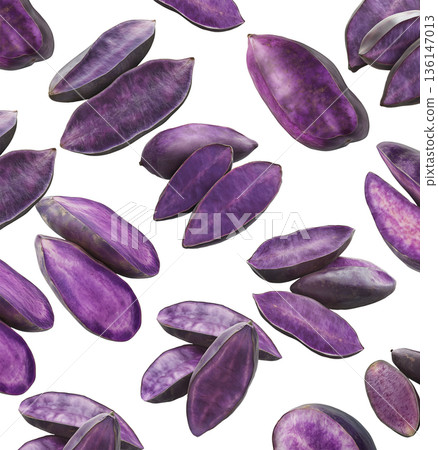 Whole and sliced purple yams or sweet potato, isolated on a white background, concept of exotic root vegetable texture 136147013