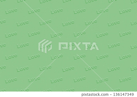 Material with the word "Love" embossed on a soft green background Material with the word "Love" embossed on a soft green background 136147349
