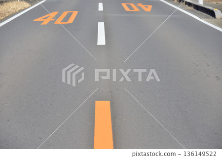 Center line between the yellow solid line and the white dashed line 136149522