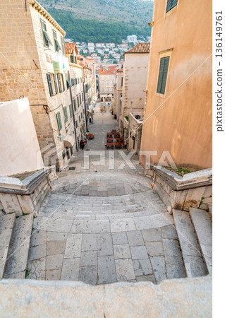Baroque staircase in Old Town Dubrovnik, the way to Church of St. Ignatius. Famous place for tourist, known as walk of shame. Baroque staircase in Old Town Dubrovnik, the way to Church of St. Ignatius. Famous place for tourist, known as walk of shame. 136149761