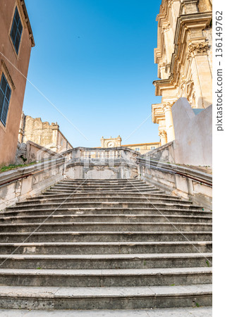 Baroque staircase in Old Town Dubrovnik, the way to Church of St. Ignatius. Famous place for tourist, known as walk of shame. Baroque staircase in Old Town Dubrovnik, the way to Church of St. Ignatius. Famous place for tourist, known as walk of shame. 136149762